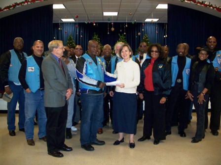 Blue Knights present gift to Sr. Mary Bader.